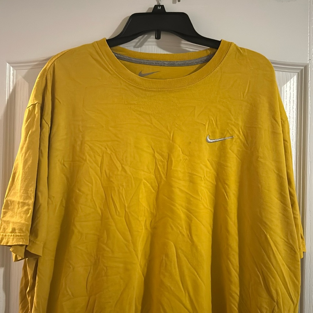 Yellow Nike shirt